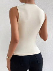 Apricot ruched mock-neck tank top with subtle ruching detail.