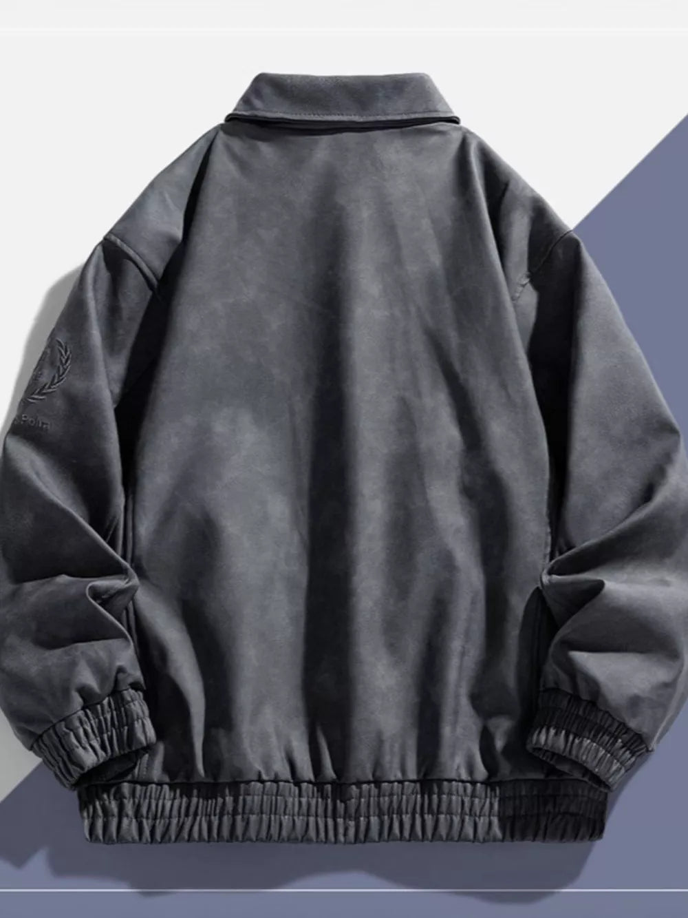 Gray bomber jacket with elastic cuffs, classic collar, and embroidered detail on sleeve.