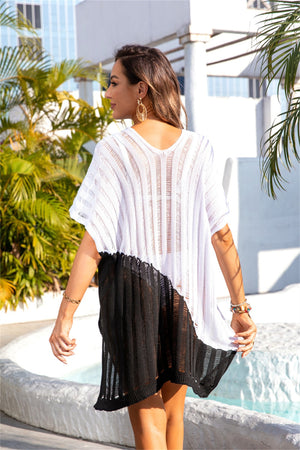 Colorblock knit beach cover-up with V-neck and short sleeves in white and black.