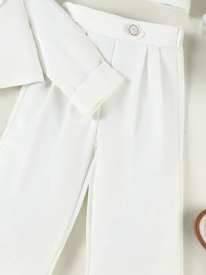 Toddler white blazer set with cropped pants and cuffed sleeves.