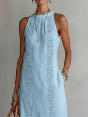 Light blue sleeveless midi dress with lace trim and pockets