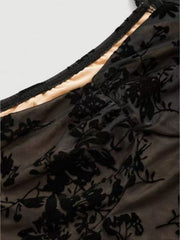 Black floral burnout mesh sweetheart mini dress with ruched detail.