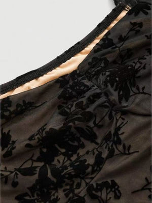 Black floral burnout mesh sweetheart mini dress with ruched detail.