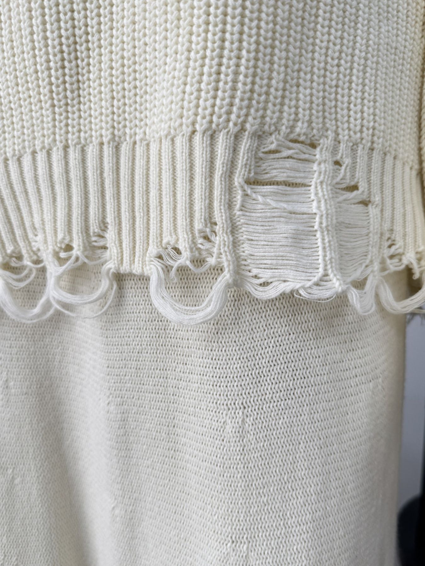Off white distressed cotton sweater set with deconstructed hem detail