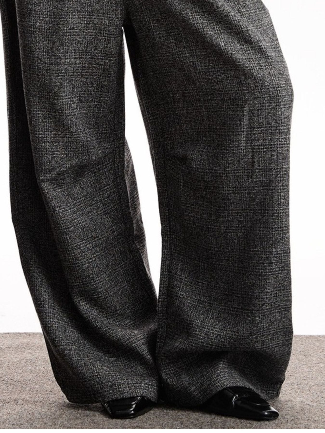 Men's gray wide leg sweatpants with a subtle plaid texture.