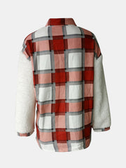 Plaid shacket with sherpa sleeves in red and white plaid.