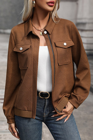 Textured chevron zip-front utility jacket in burnt umber with two chest pockets and a bomber style hem.