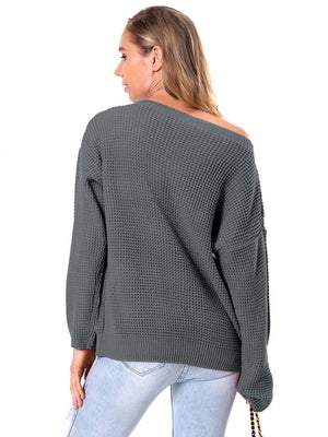 Charcoal waffle knit slouch sweater with off-shoulder neckline and long sleeves.