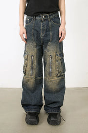 Distressed dark wash wide-leg cargo jeans with zip pockets and a relaxed fit.