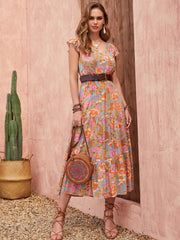 Bohemian floral tiered midi dress with flutter sleeves and a V-neck, in multicolor.