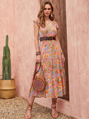 Bohemian floral tiered midi dress with flutter sleeves and a V-neck, in multicolor.