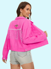 Hot pink distressed denim jacket with crystal fringe and ripped back detail.