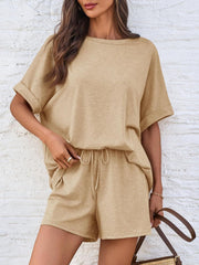 Tan relaxed fit tee and shorts co-ord set with cuffed sleeves and drawstring waist.
