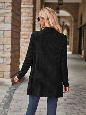 Black ribbed open-front cardigan with pockets and long sleeves.