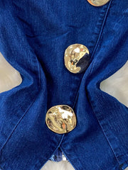 Dark blue cotton vest with asymmetrical button detail and gold buttons.