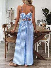 Light blue striped backless wide-leg jumpsuit with a large bow detail on the back.