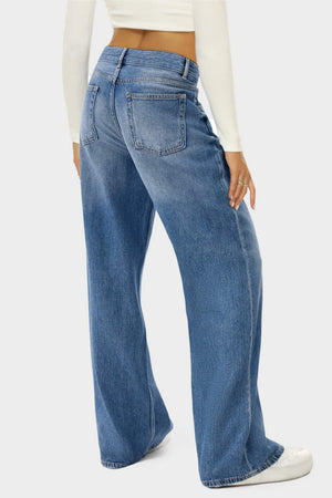 Wide-leg denim jeans in Dusty Blue with a subtle fade and button closure.