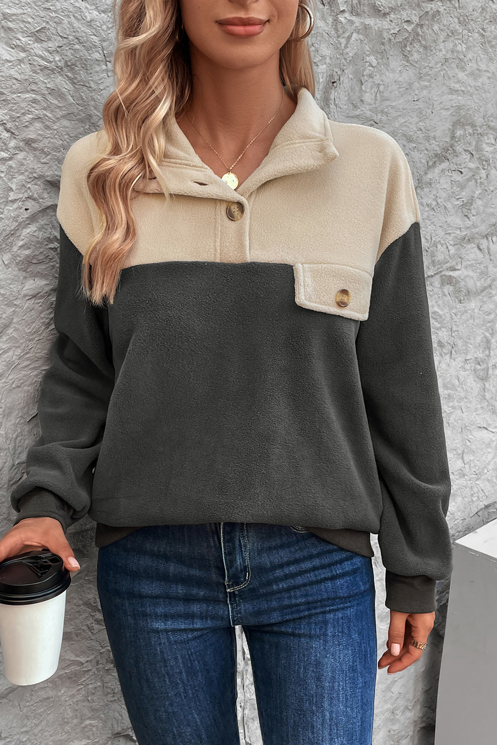 Colorblock fleece button-up pullover with button chest pocket and collar in dark gray and beige.