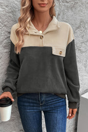 Colorblock fleece button-up pullover with button chest pocket and collar in dark gray and beige.