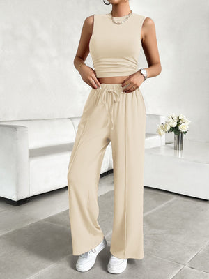Tan ribbed crop top and wide-leg lounge pants with drawstring waist.