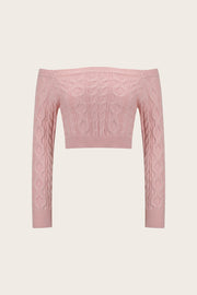 Blush pink cable knit cropped off-the-shoulder sweater with long sleeves.