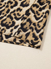 Chic leopard print two-piece set with buttoned shirt detail.