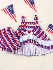 Star-spangled ruffled dress and shorts set with bows, blue and red cotton fabric.