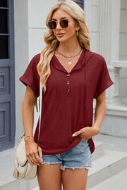 Burgundy perforated henley hooded tee with short sleeves and button detail