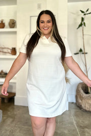 Ivory textured V-neck short sleeve mini dress with geometric pattern