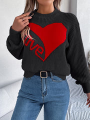 Black knit sweater with a red heart and "love" graphic, crew neck, long sleeves.