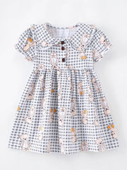Gingham teddy bear print toddler dress with button-down collar and short sleeves.