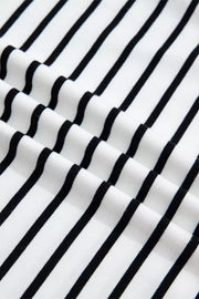 White cotton tank top with black stripes and ruffled detail.