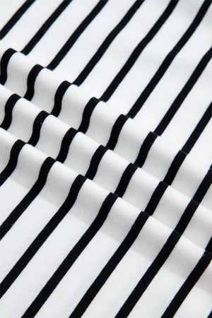 White cotton tank top with black stripes and ruffled detail.