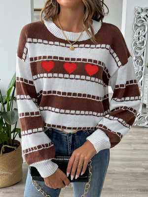 Brown and white striped knit sweater with embroidered red hearts and a crew neck.