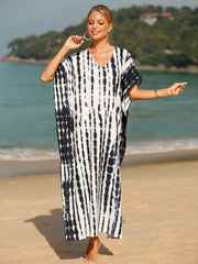 Black tie-dye maxi kaftan with vertical stripes and V-neck.