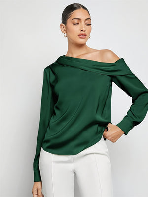 Dark green silk-effect blouse with asymmetric neckline and long sleeves.