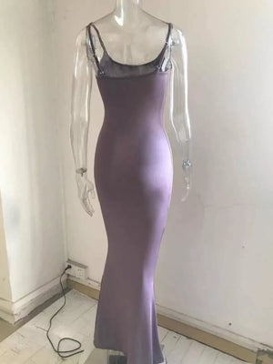 Mauve spaghetti strap bodycon maxi dress with a sheer neckline detail.