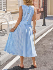 Buttoned two-piece set in sky blue and white vertical stripes, sleeveless top with back buttons, A-line midi skirt with