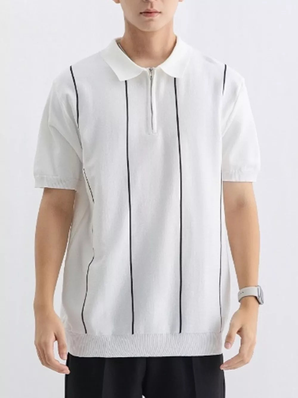 White knit polo shirt with black vertical stripes and quarter zip neckline.