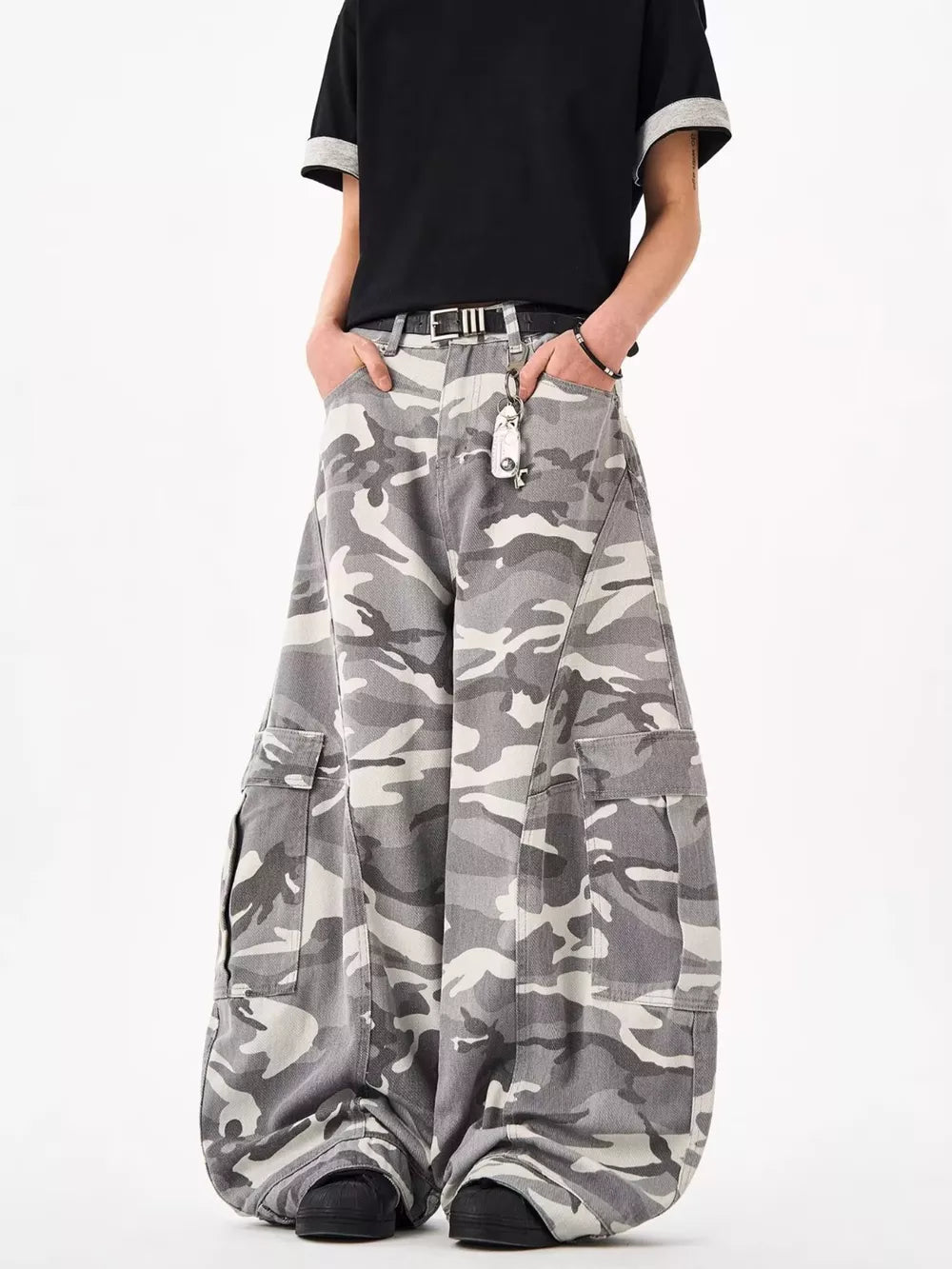 Urban camo oversized cargo sweatpants with multiple pockets and a relaxed fit.