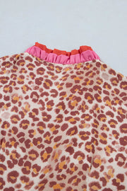 Leopard print dress with ruffled pink and orange V-neck detail