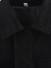 Black oversized zip-up jacket with a collared neckline and visible seams.