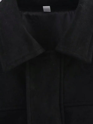 Black oversized zip-up jacket with a collared neckline and visible seams.