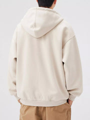 Apricot casual loose fit zip-up hoodie with hood and ribbed cuffs.