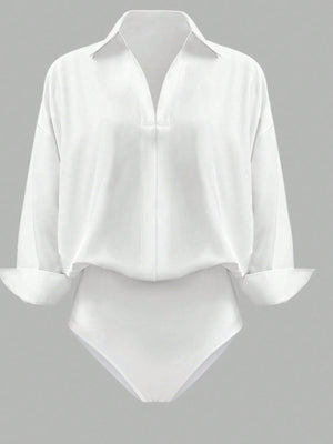 White collared long sleeve bodysuit with cuffed sleeves and a deep V-neckline.