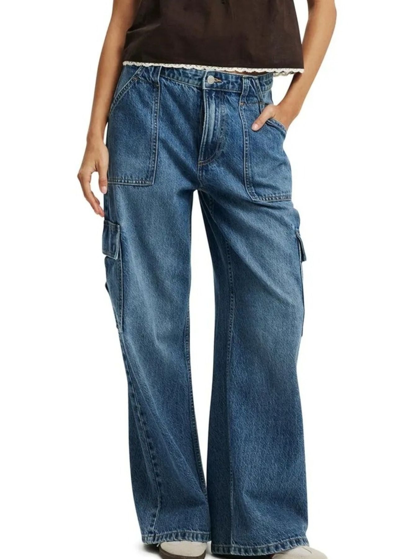 Light blue denim wide leg cargo jeans with buttoned front and multiple pockets.