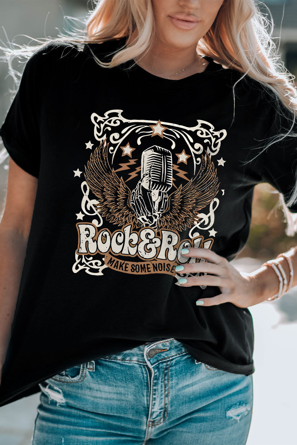 Black graphic tee with a vintage microphone, wings, and Rock & Roll text.
