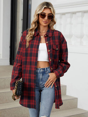 Oversized red and black plaid shacket with button front and chest pockets.
