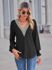 Black eyelet lace inset blouson sleeve top with ruffled cuffs