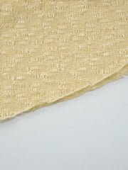 Yellow sheer one-shoulder cropped cardigan with open knit detail
